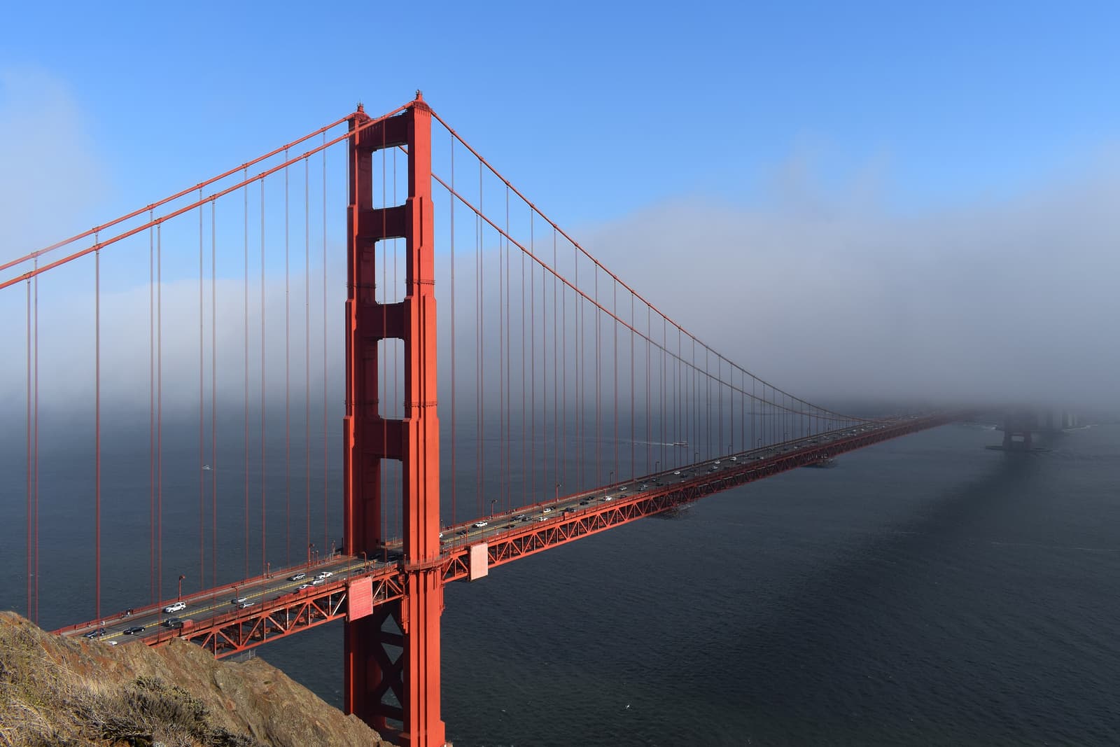 The Golden Gate Bridge rising out of the fog, San Francisco